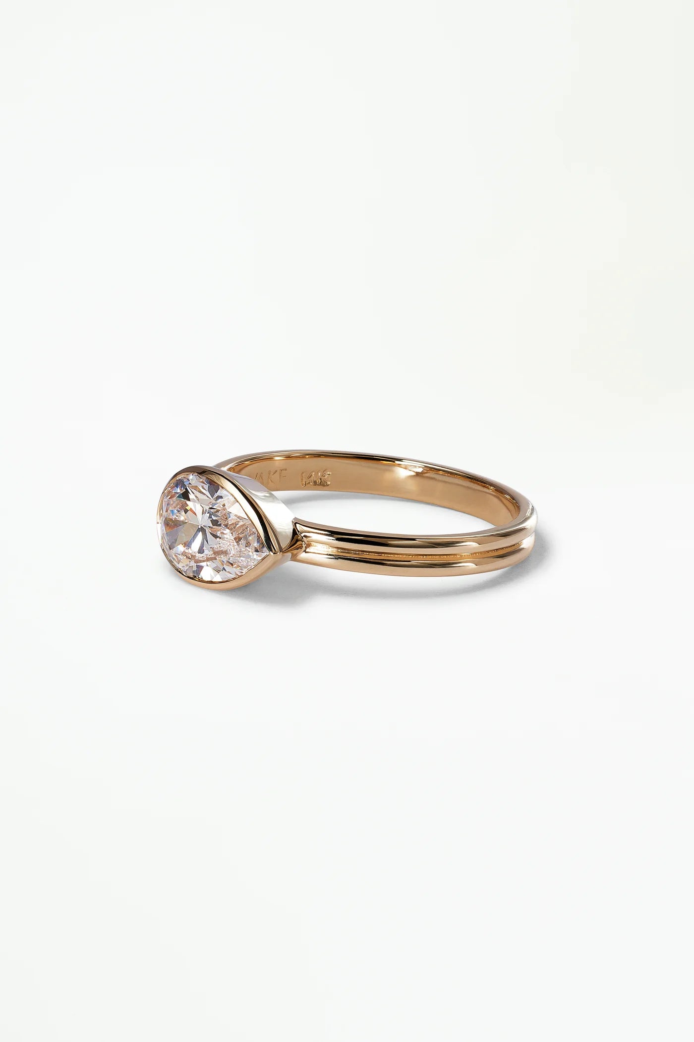 Pear Cut Diamond Ridge Solitaire Ring — Commitment, Curated