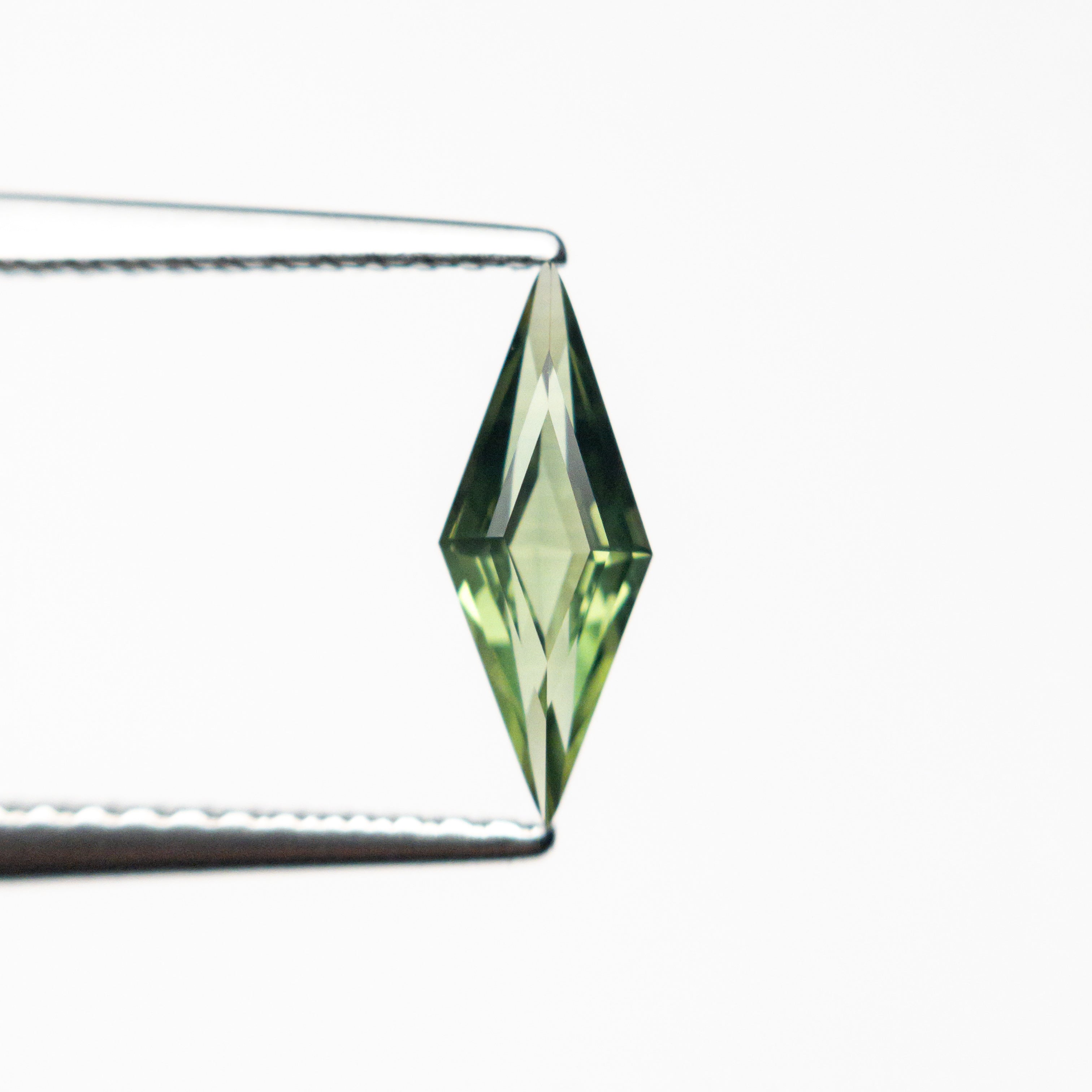 0.51ct 9.97x3.79x2.39mm Lozenge Step Cut Sapphire 25740-11