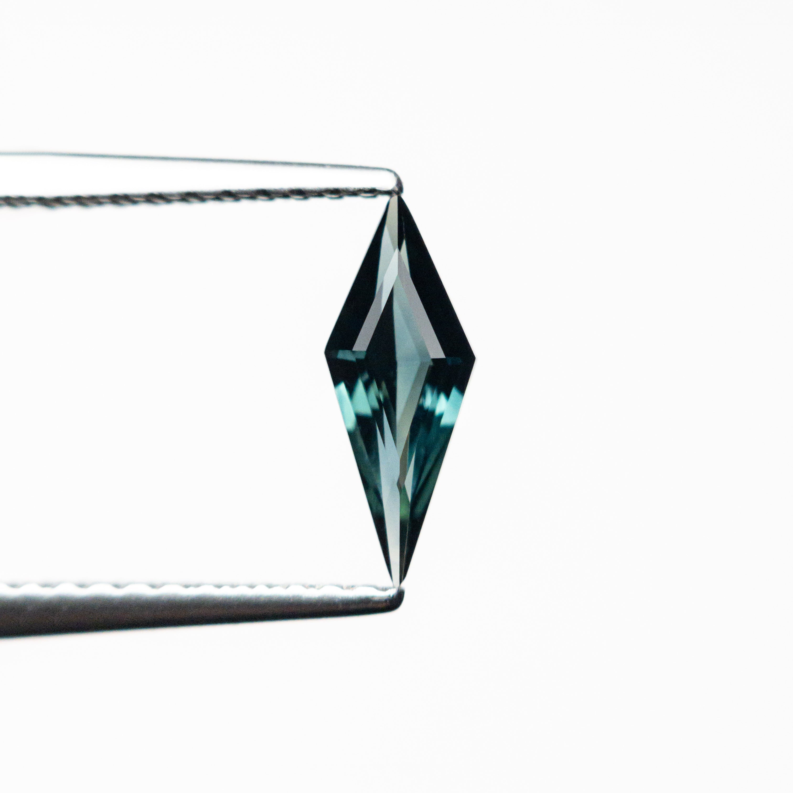 0.46ct 9.62x3.77x2.27mm Kite Step Cut Sapphire 25740-17