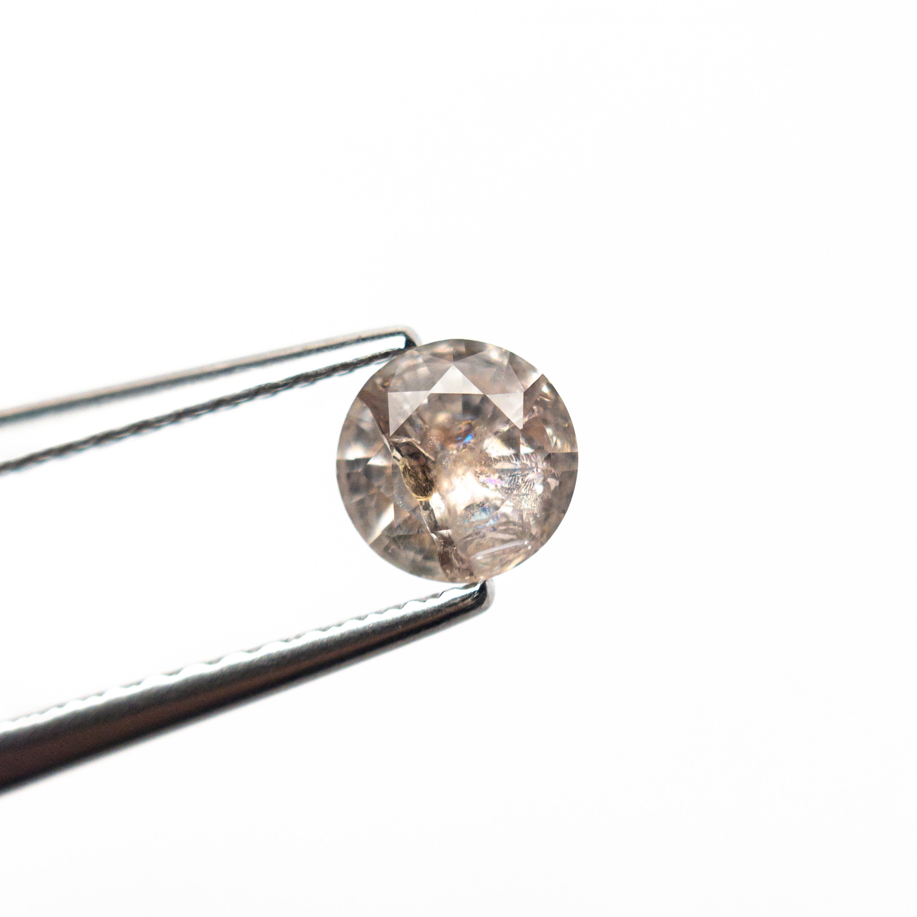 0.57ct 5.03x4.97x3.11mm Round Brilliant Sapphire 26556-05