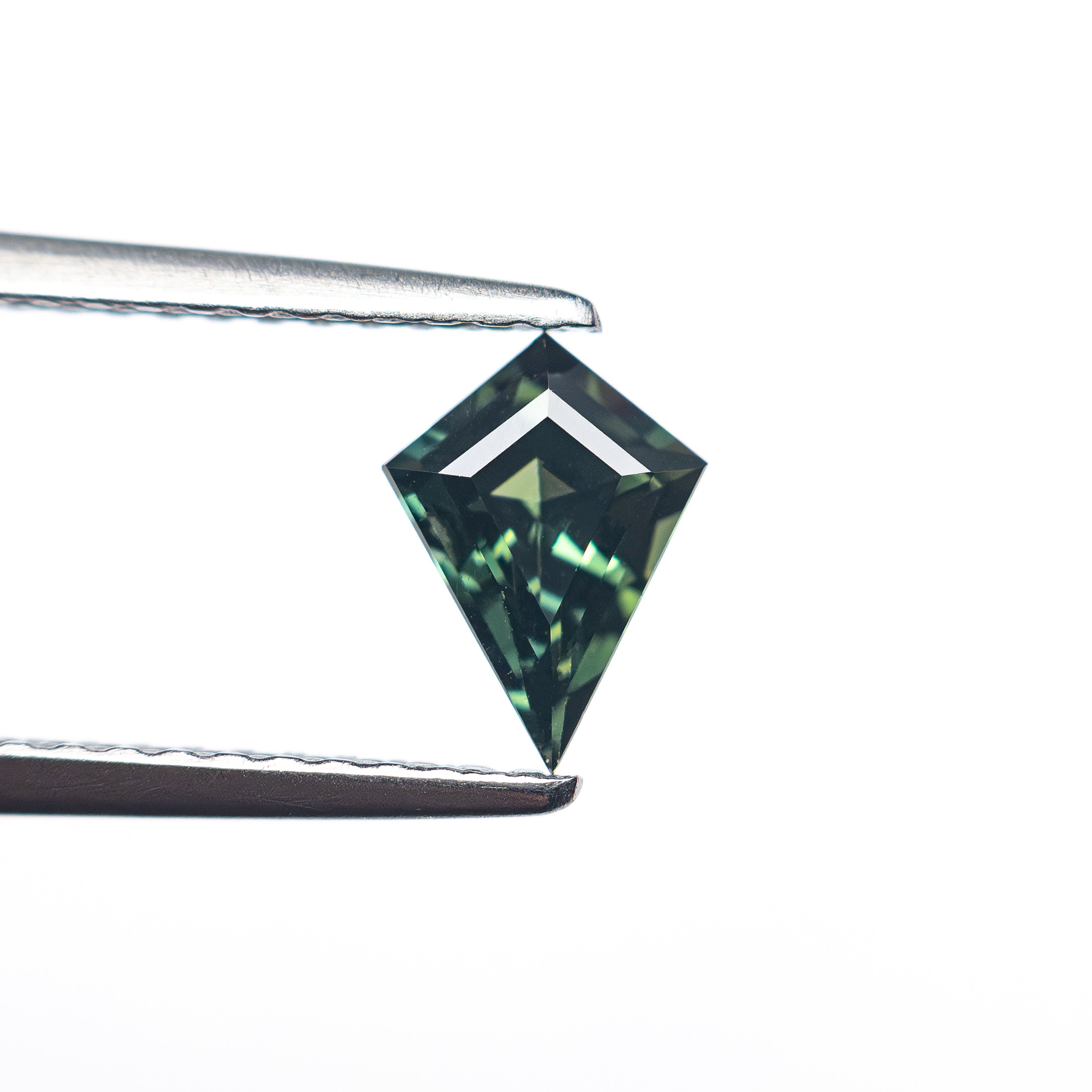 0.60ct 7.22x4.75x3.22mm Kite Step Cut Sapphire 27336-19