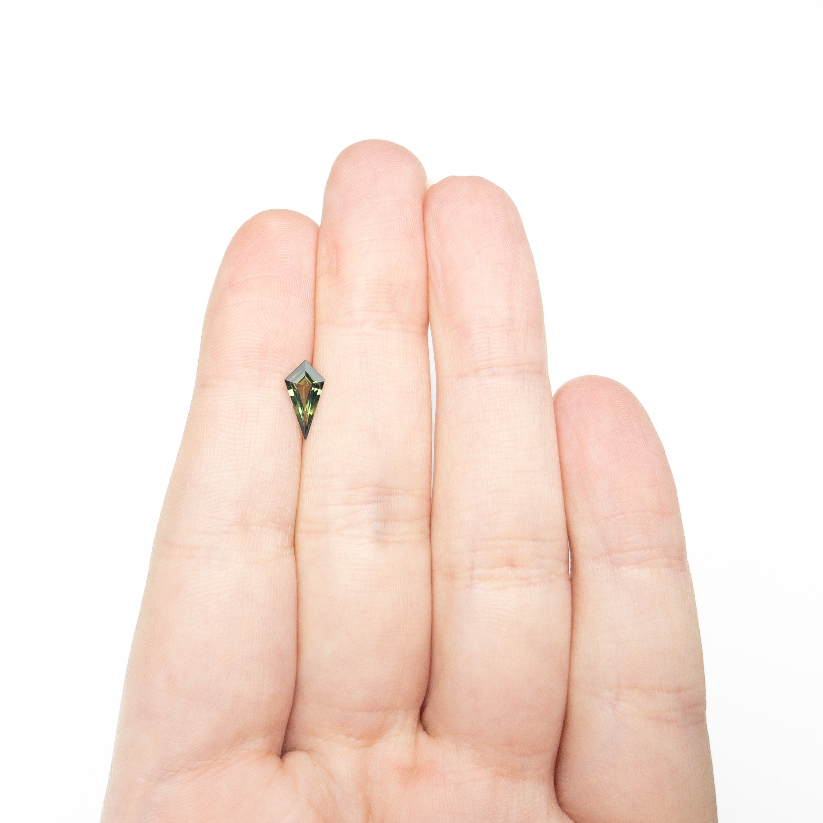 0.65ct 10.38x5.16x2.46mm Kite Step Cut Sapphire 27336-20