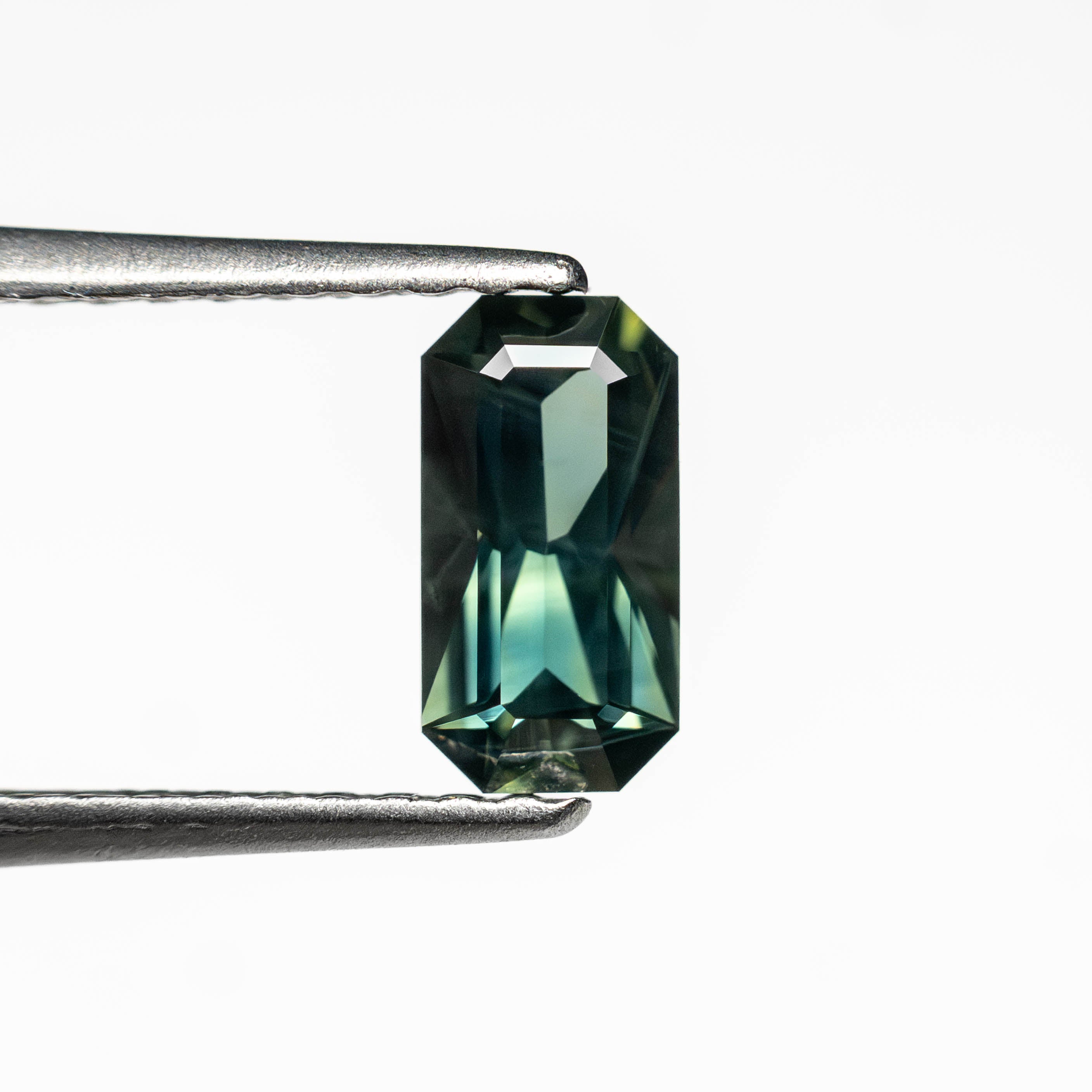 0.60ct 6.93x3.63x2.58mm Cut Corner Rectangle Step Cut Sapphire 27336-39