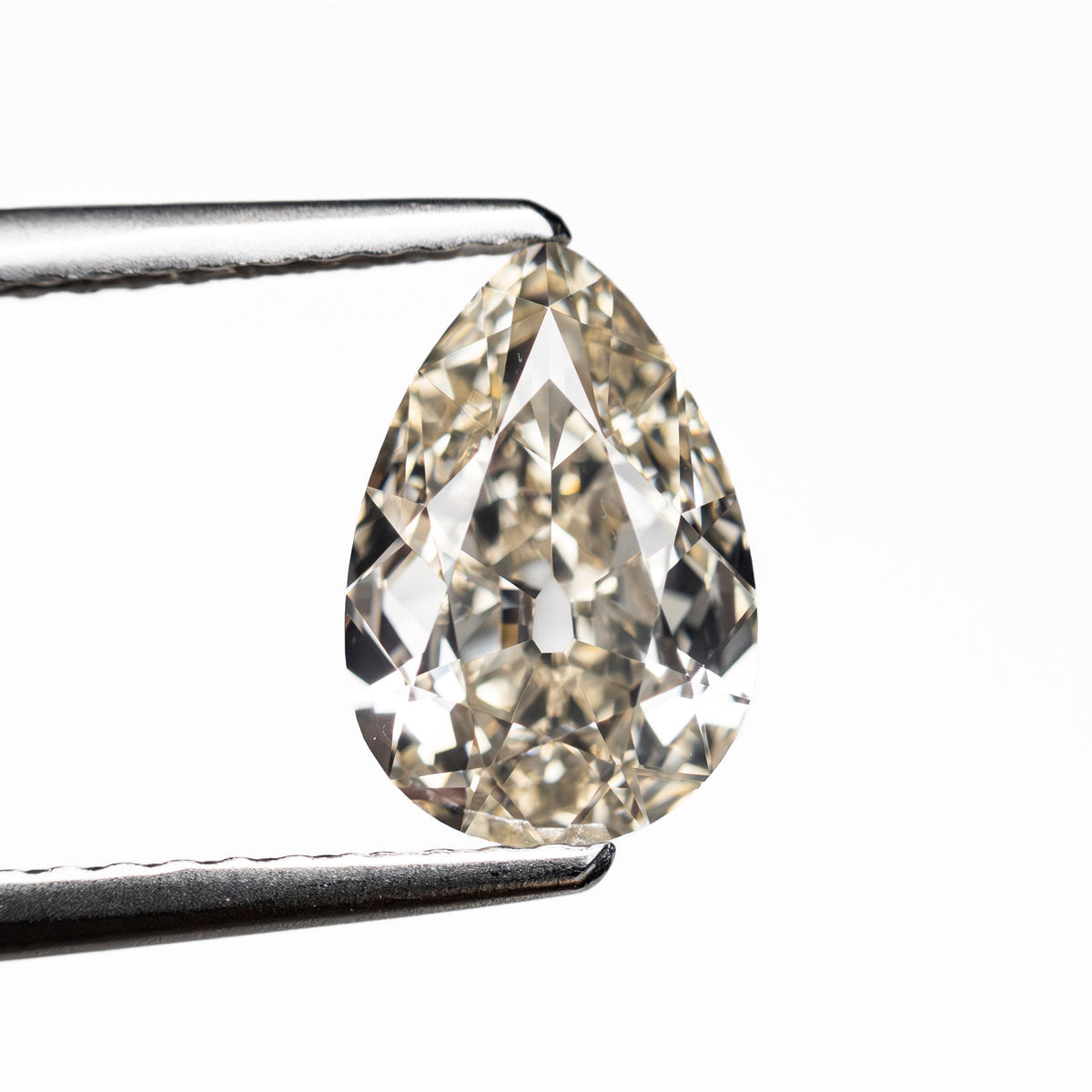 1.28ct 9.24x6.28x3.17mm GIA VVS2 M Pear Brilliant 28021-01