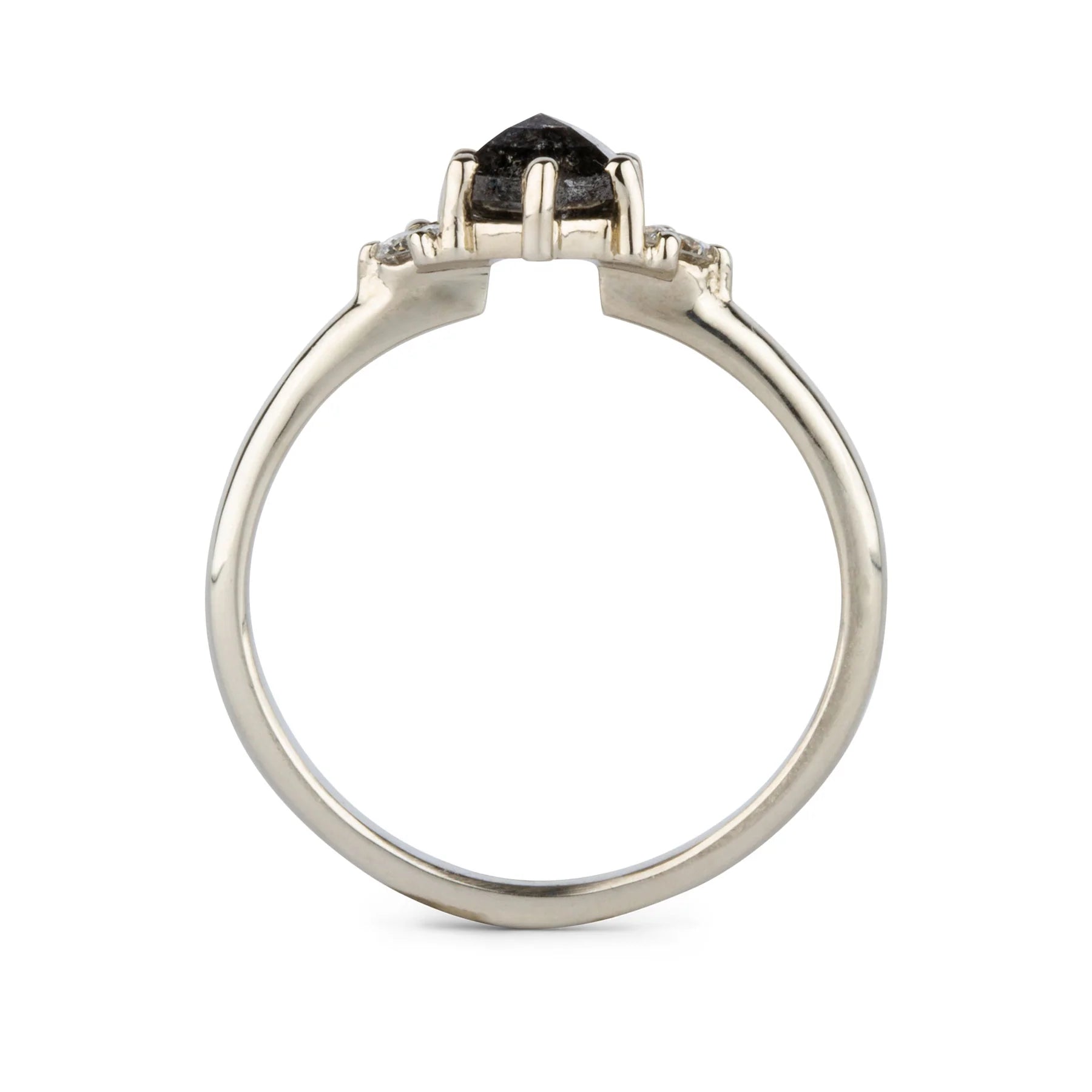 A .77 ct hexagon diamond is the center of this edgy ring as Canadian diamonds flank each side with sparkle. Sideview of lofted setting.