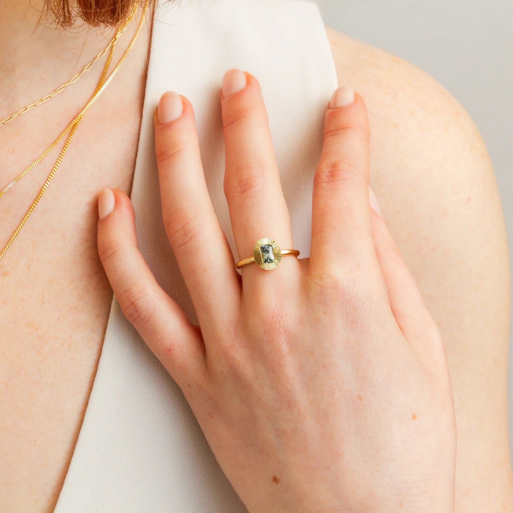 North-South Blue-Green Radiant Montana Sapphire Aurora Ring