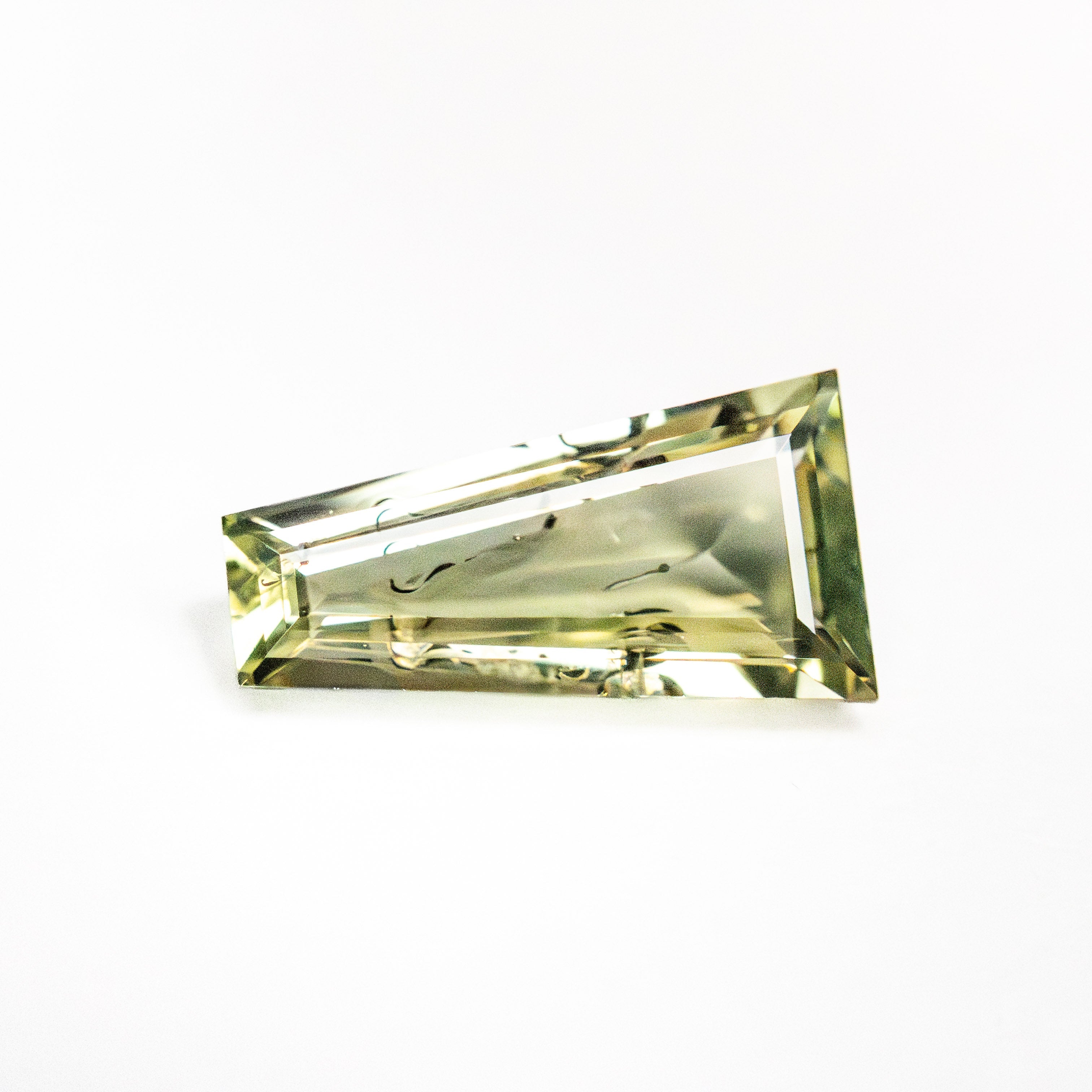 1.55ct 9.73x5.22x3.19mm Trapezoid Step Cut Sapphire 22434-147
