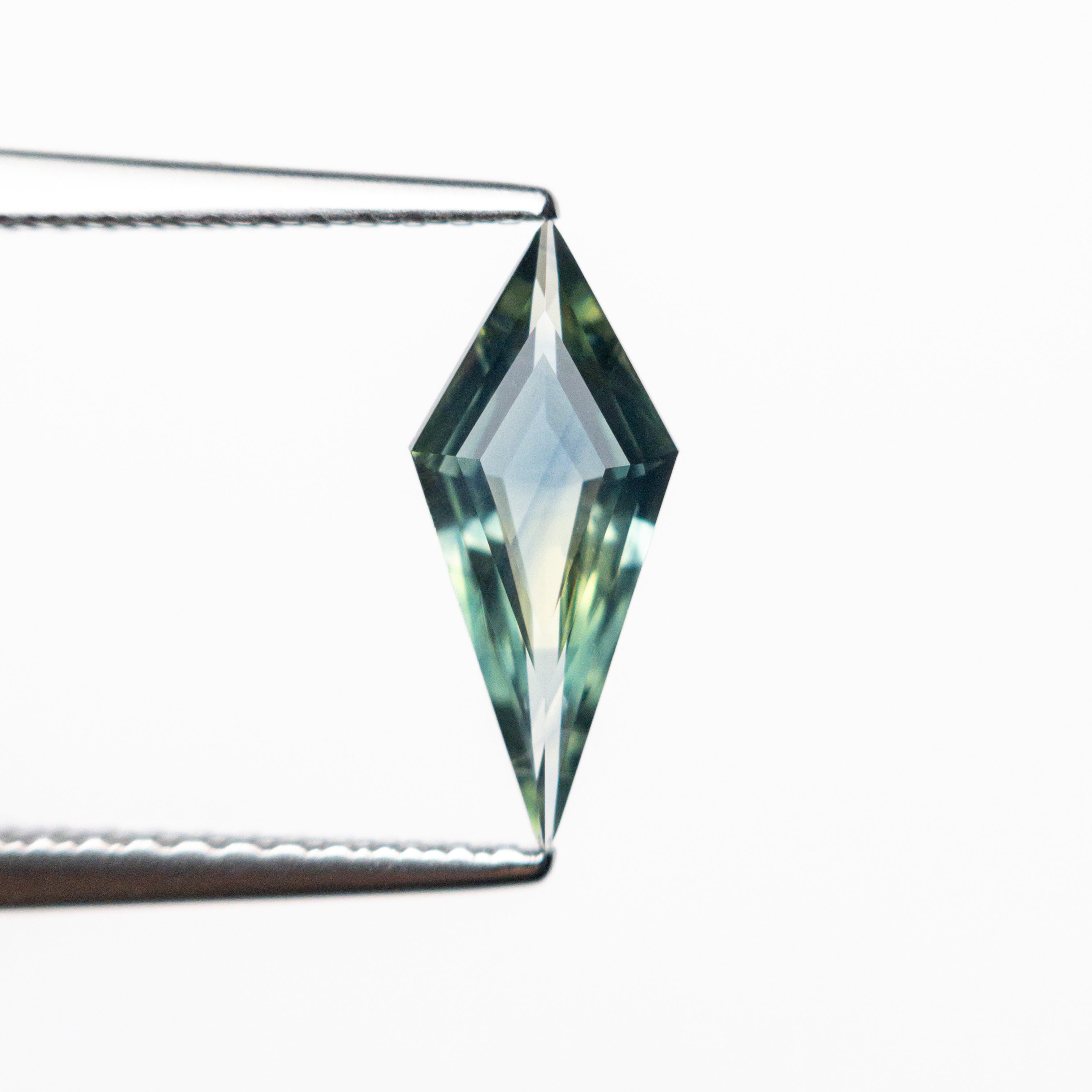 0.70ct 11.20x4.81x2.36mm Kite Step Cut Sapphire 25740-09