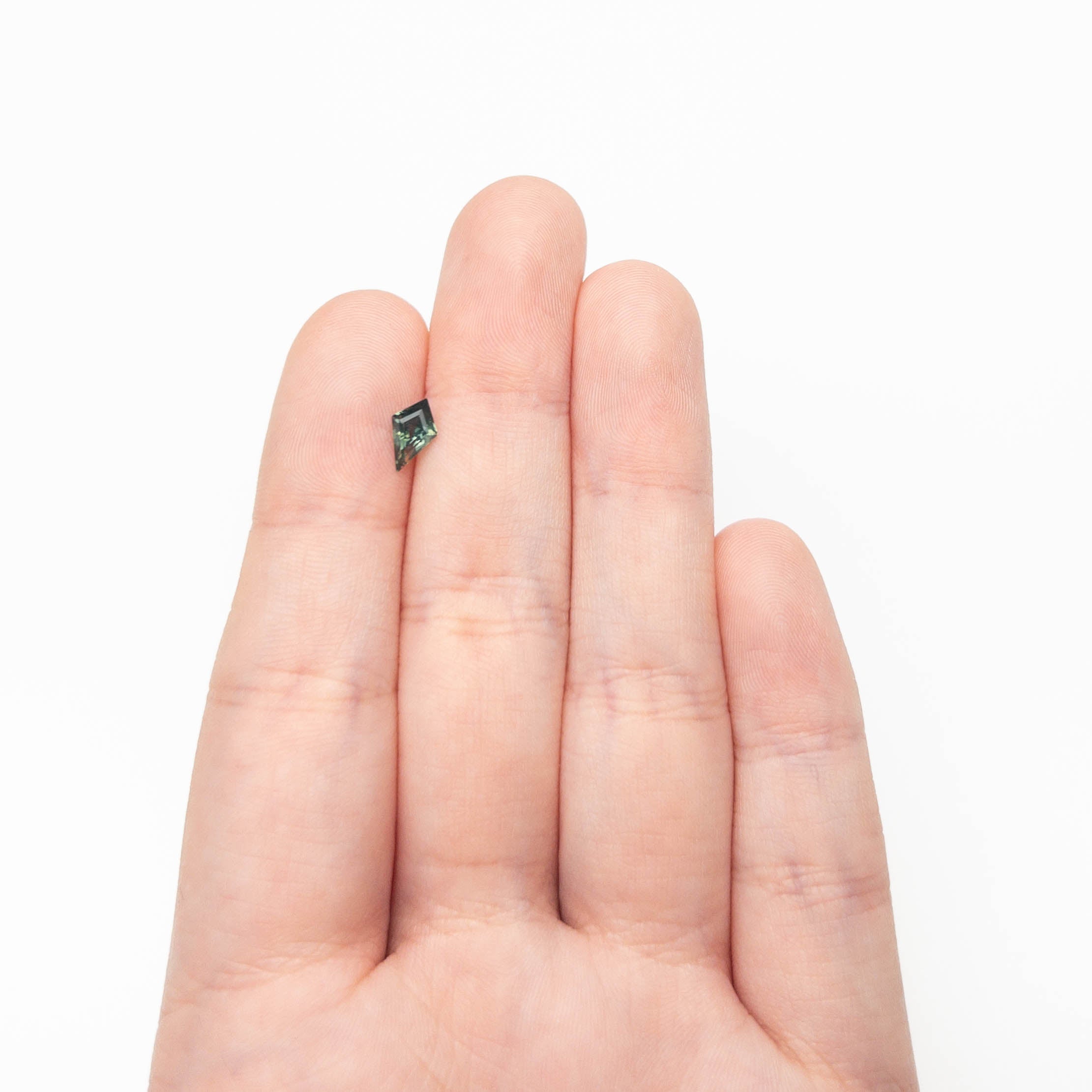 0.67ct 8.12x4.94x3.15mm Kite Step Cut Sapphire 27363-15