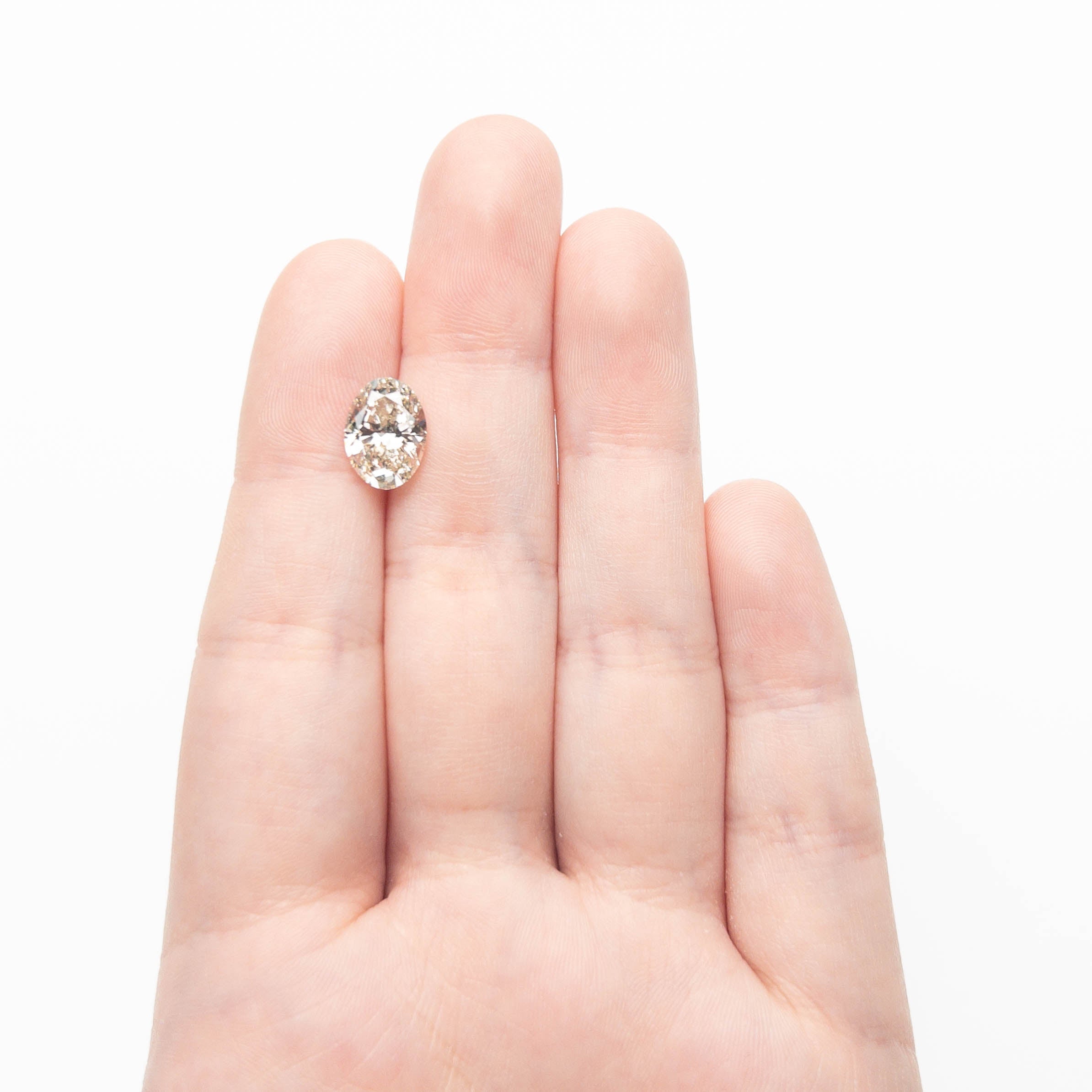 3.07ct 11.18x8.09x5.16mm SI1 Q-R Oval Brilliant 27382-01