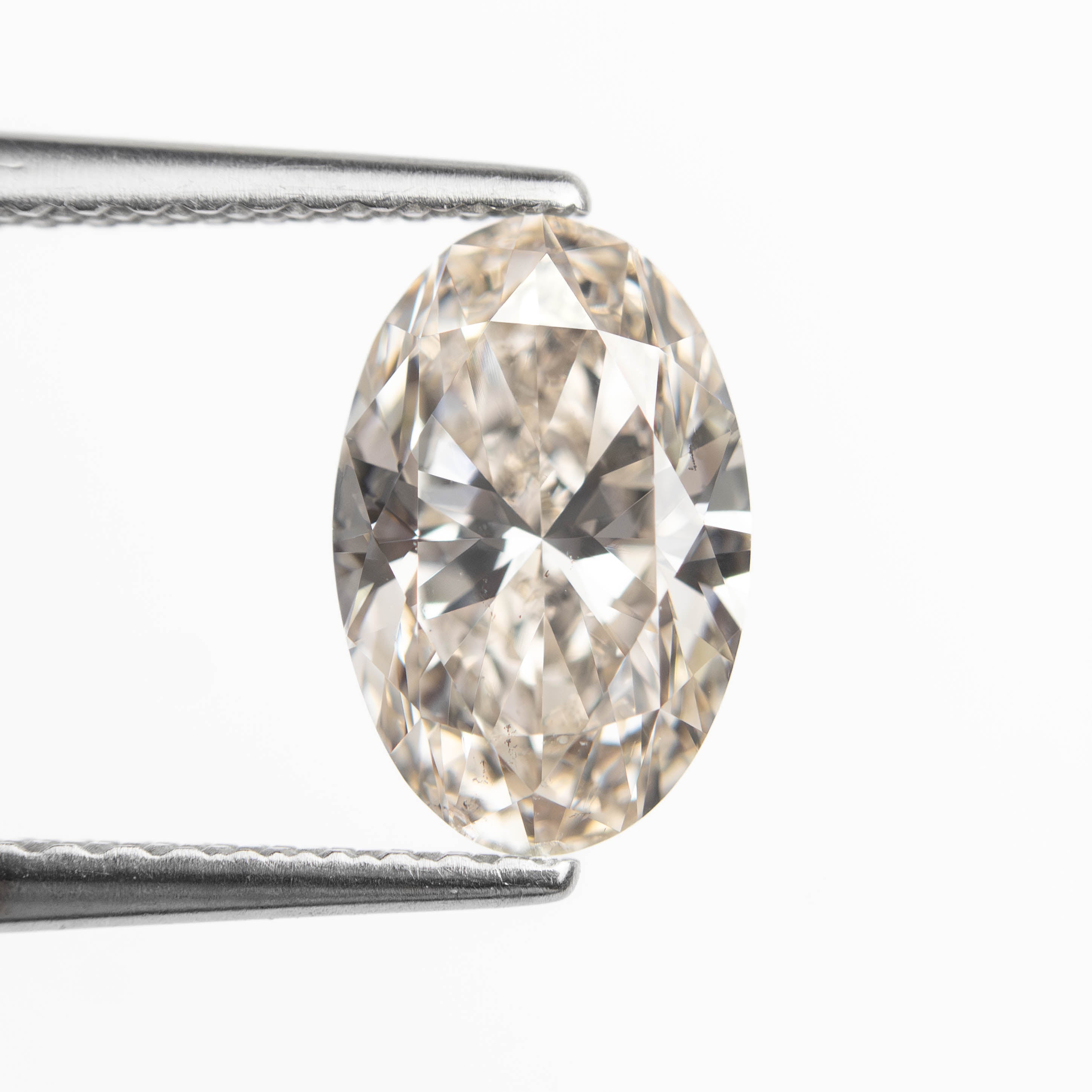 1.50ct 9.27x6.07x3.96mm SI2 K Oval Brilliant 27386-02