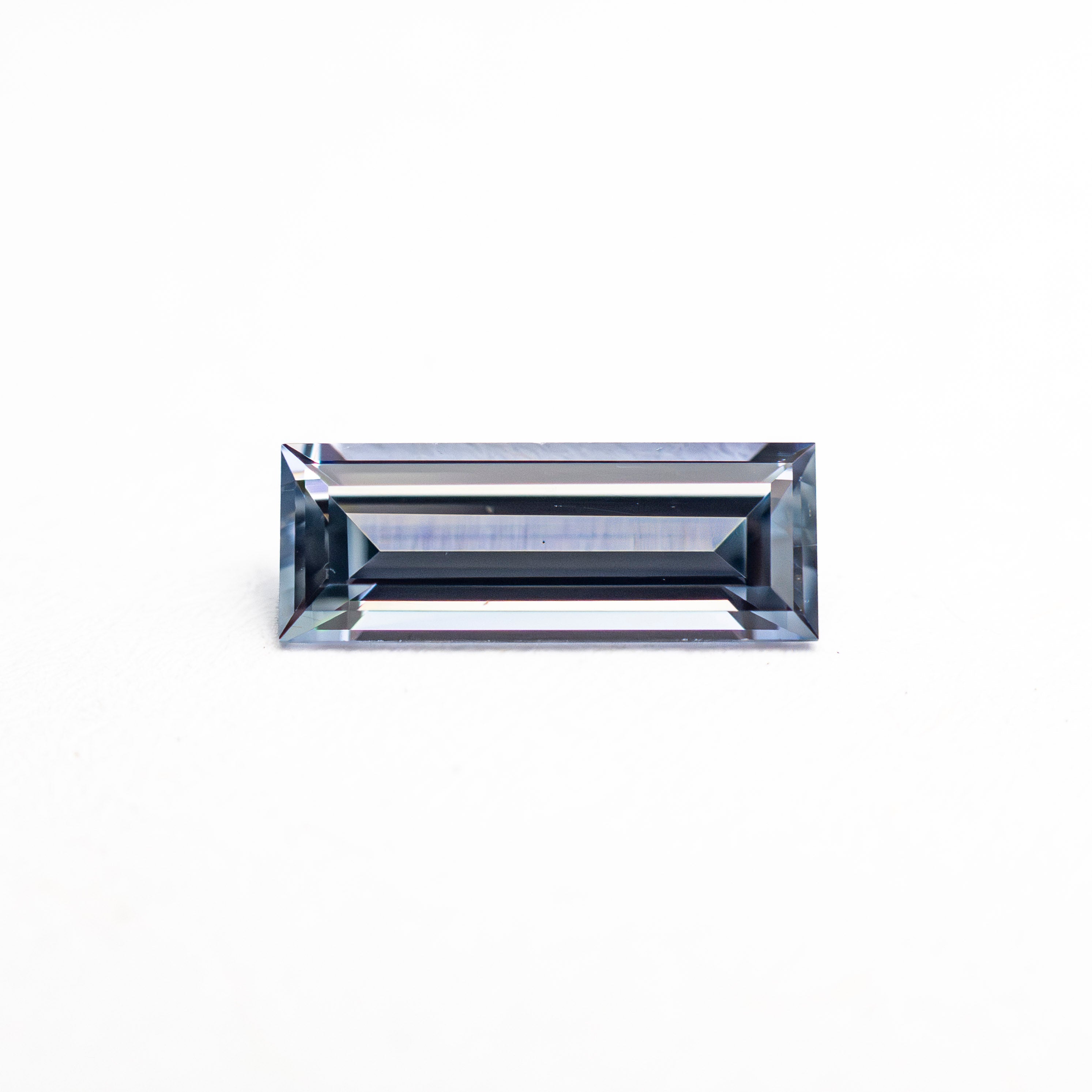 0.57ct 8.05x3.02x2.09mm Baguette Step Cut Sapphire 27721-02