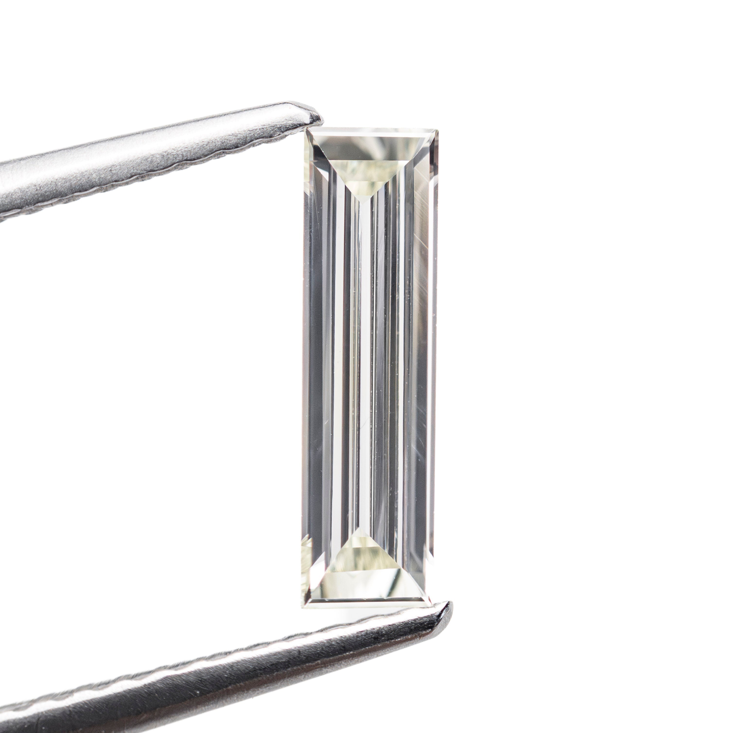 0.45ct 10.50x2.98x1.42mm VS2 Q-R Baguette Step Cut 27911-01