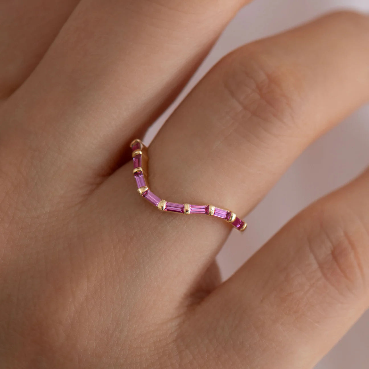 Curved Pink Baguette Sapphire Ring