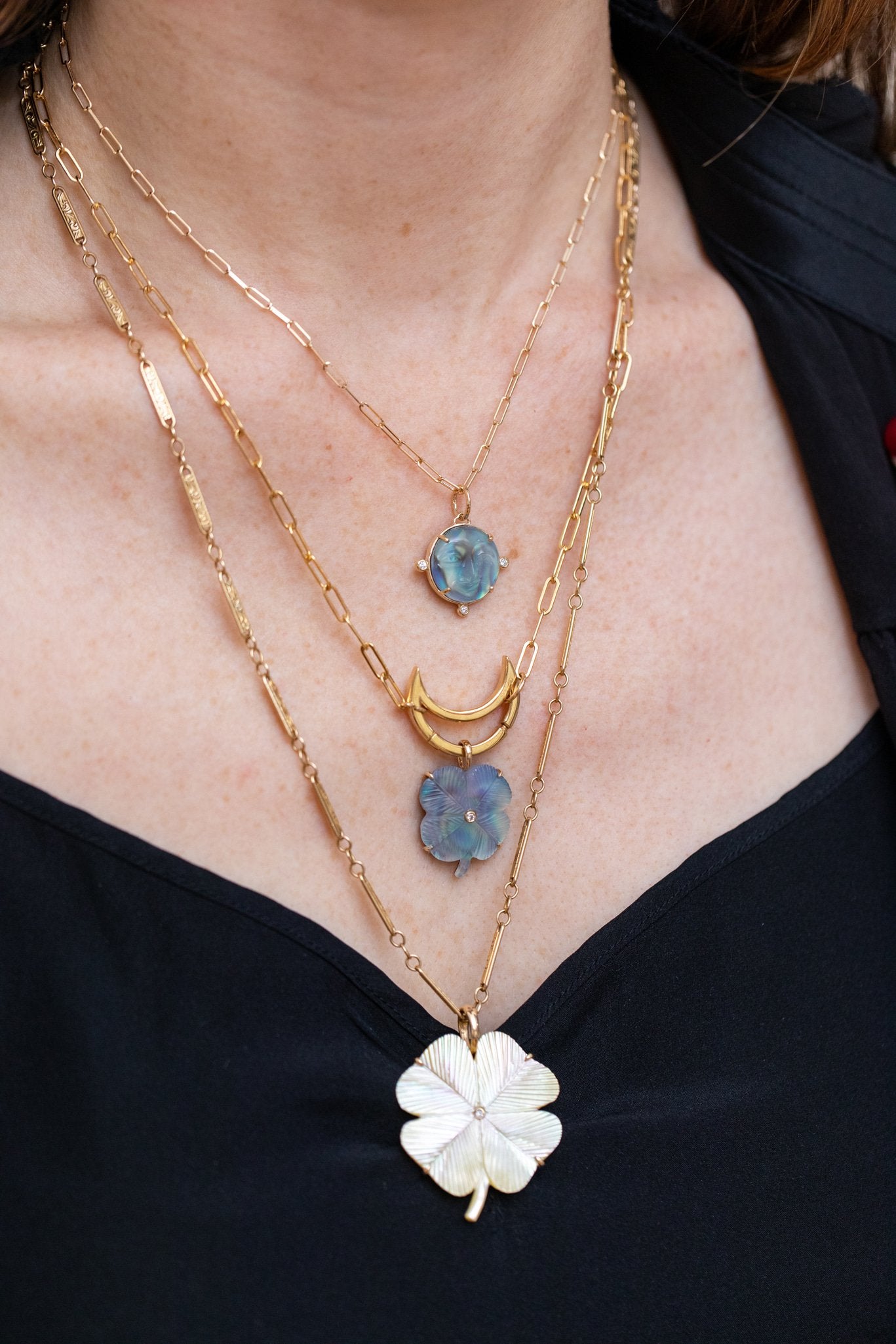Luminescent Moon Face Charm