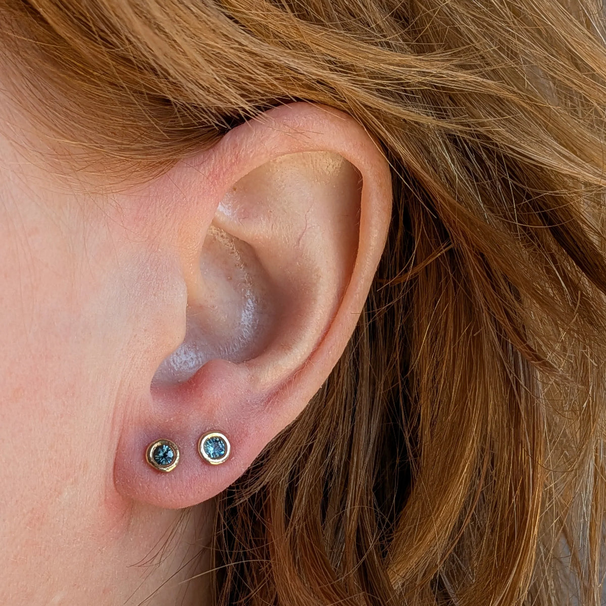 Denim Sapphire Wrap Studs