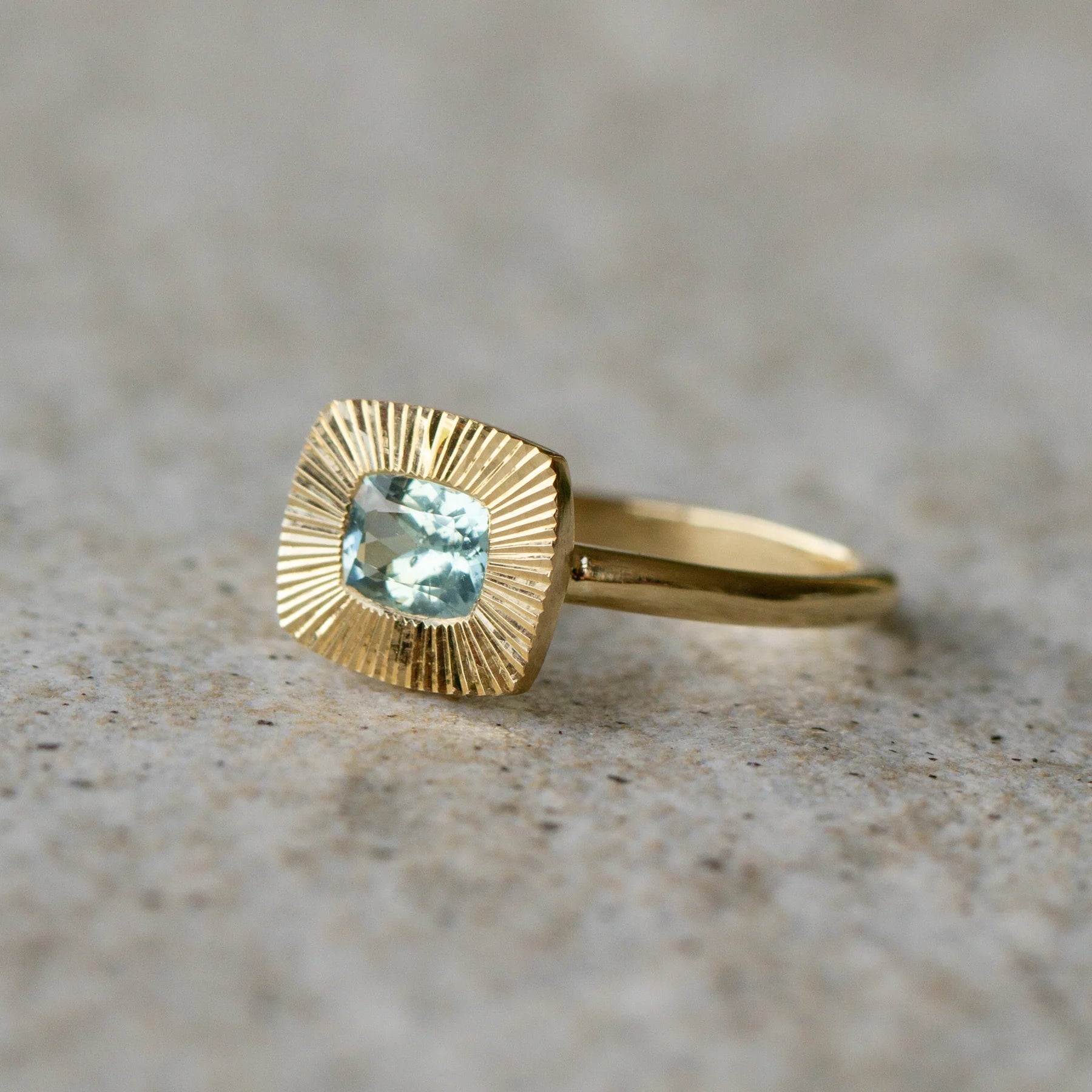 East-West Light Teal Cushion Montana Sapphire Aurora Ring